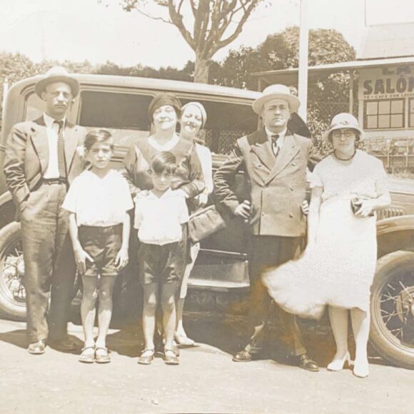 Postcard with a photograph of part of the Giucci family